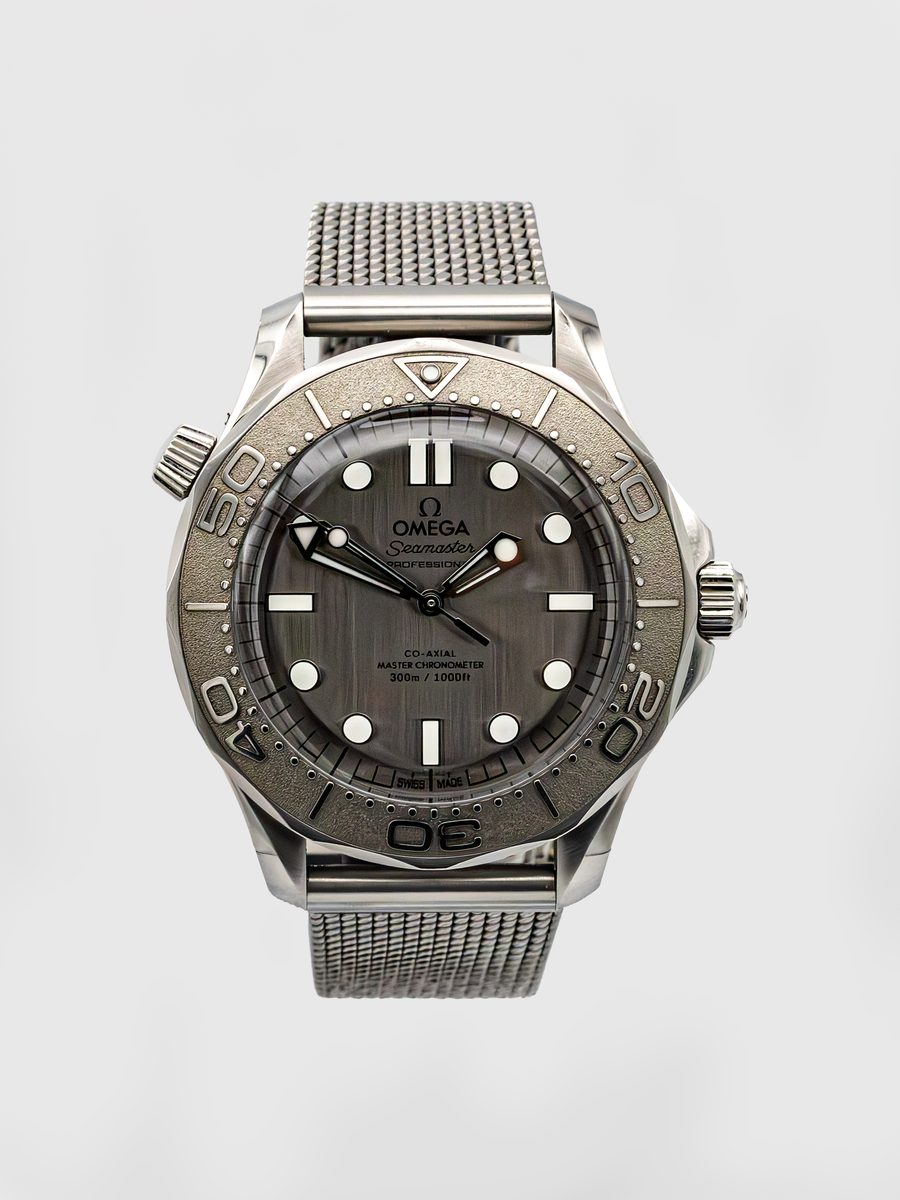 Omega Seamaster Diver 300M 007 Edition 210.92.42.20.01.001 grey tropical dial titanium mesh bracelet preowned luxury watch - front view