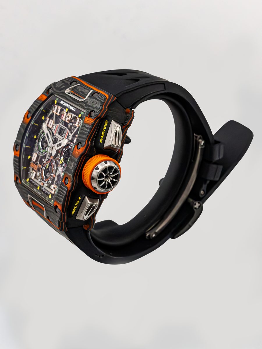 Richard Mille RM 11-03 McLaren Carbon TPT and Orange Quartz TPT flyback chronograph preowned luxury watch - angle view